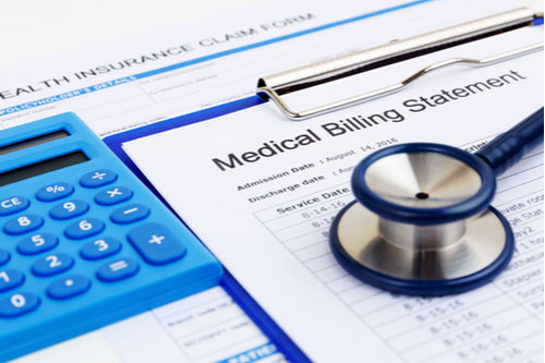 medical bill and calculator representing personal injury damages